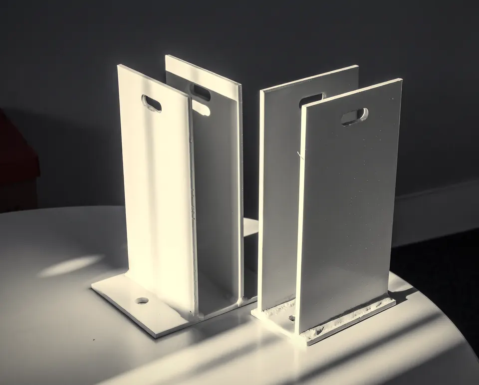 Fabricated brackets finished in white