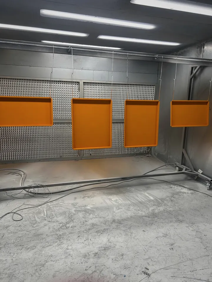 Orange trays in the spray bay